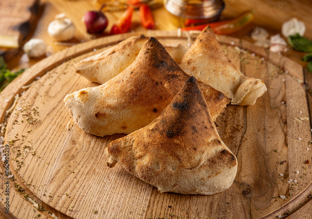 Poster calzones on wooden board