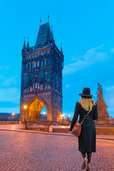 View of Charles Bridge and Lesser Bridge Tower in Prague, Czech Republic