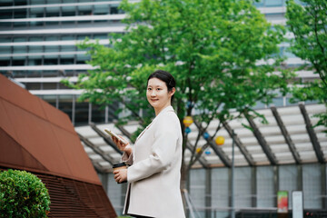 Professional Businesswoman Outside Office Building