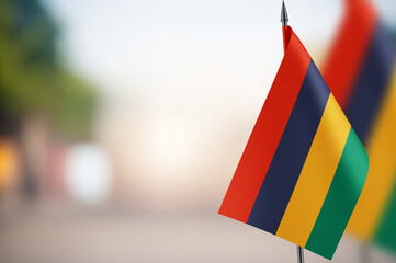 Small flags of Mauritius on a blurred background