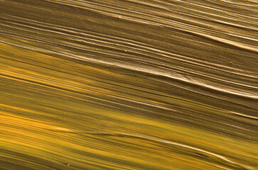 art background in gold colors striped