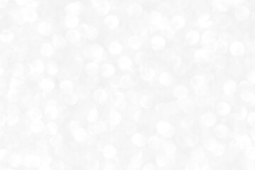 White and gray bokeh background. Concepts of New Year, Christmas, Wedding Anniversary and all celebrations.	
