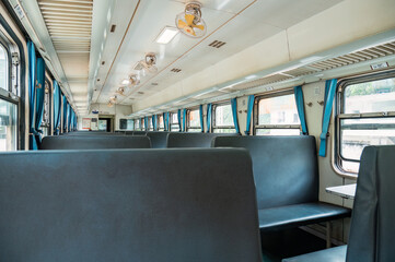 Fototapeta premium China Railway, inside a hard seat compartment of an old green train.