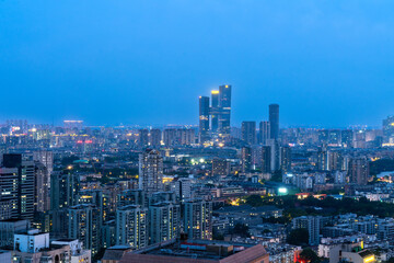Fototapeta premium Evening City Skyline Above Urban Downtown