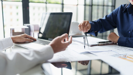 Architecture drawing on architectural project business architecture building construction Colleagues designer Planning Design on blueprint and compasses