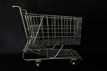 shopping cart isolated on black