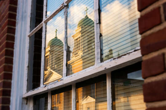 Downtown architecture reflecting in window, Paducah Kentucky