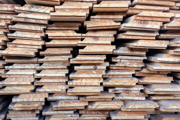 wooden planks stack texture, pile stored outdoors to dry