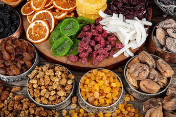 Composition with dried fruits and assorted nuts. Nutritious Energy Snack. Candied fruit, Dry fruit Nut. Healthy vegetarian food. Mix of nuts , dried and candied fruit background.