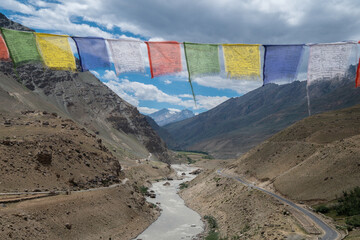 A valley surrounded by mountains with a river flowing in the foreground, Zanskar, Himalayas