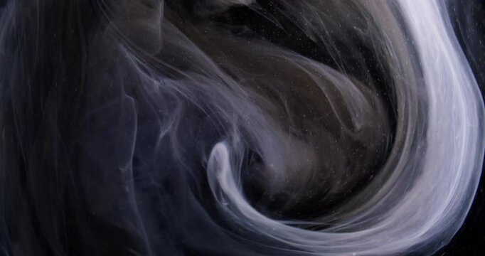 Smoke swirl. Ink water vortex. Blur purple gray glowing particles texture mist paint splash wave on dark black abstract art background.