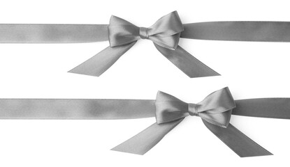 Beautiful silver satin bows isolated on white