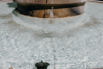 water flowing into a fountain