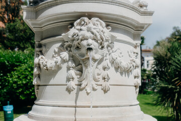 details on a fountain in a park