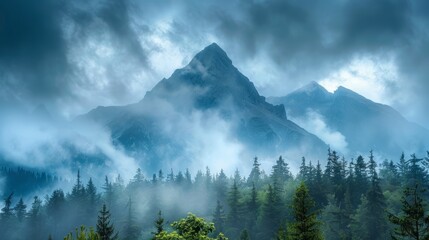 Mountain range enveloped in fog