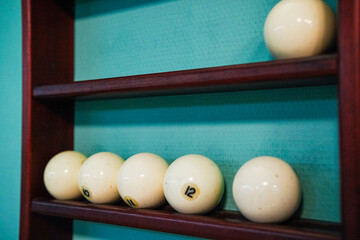 Sports game of billiards on a green cloth