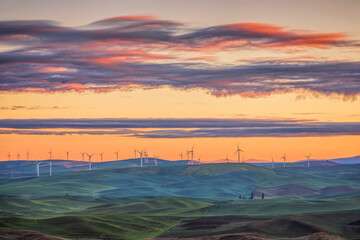 Sunset view of the rolling hills of the Palouse and wind turbines seen from Steptoe Butte