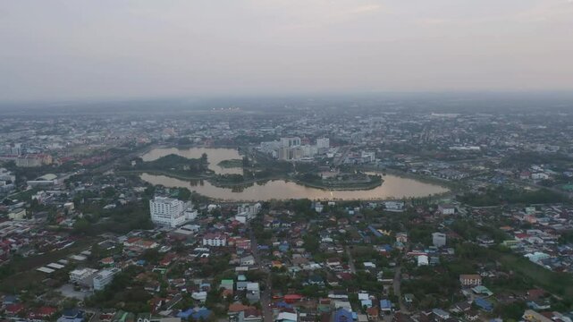 Aerial view of Udon Thani, residential neighborhood roofs. Urban housing development from above. Top view. Real estate in Kalasin, Isan province city, Thailand. Property real estate.