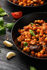 Eggplant and Chickpea Stew in tomato sauce, garlic, spices and pita bread. Healthy food
