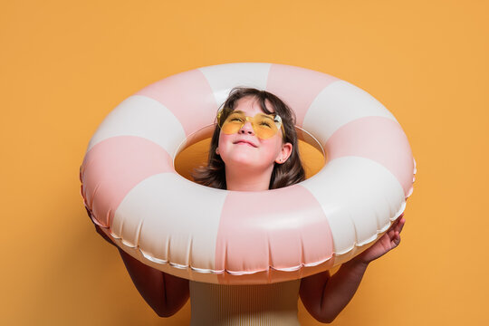 Young girl enjoying a summer theme in studio setting