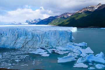 View of Perito Moreno Glacier with pieces of blue ice floating in the water, Los Glaciares National Park, Argentina