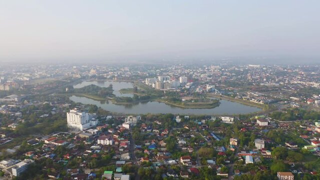 Aerial view of Udon Thani, residential neighborhood roofs. Urban housing development from above. Top view. Real estate in Kalasin, Isan province city, Thailand. Property real estate.