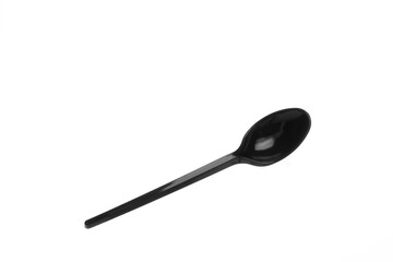 Disposable spoon. Plastic cutlery. Plastic dishes.