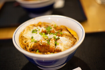 top view katsudon menu dish , Japanese pork fry with eggs and sauce serve on tray 