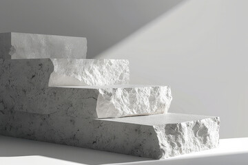 White pieces of stone slabs forming a podium with space for products
