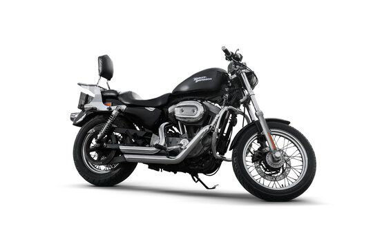 Side view of a 2009 Harley Davidson motorcycle photographed on a transparent background