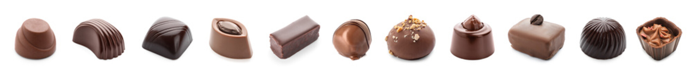 Set of many different chocolate candies on white background