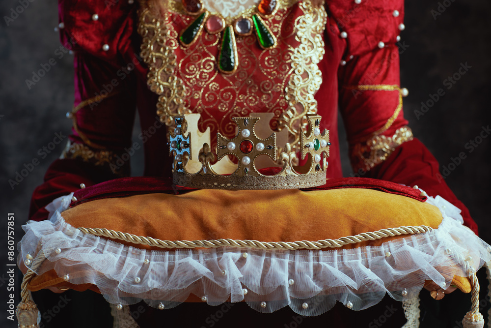 Sticker closeup on medieval queen in red dress with crown on pillow