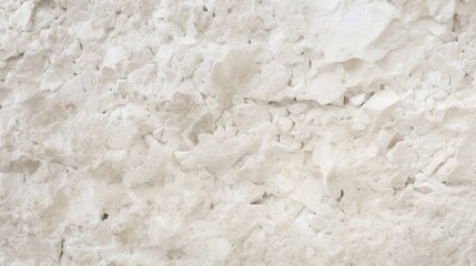 A high-resolution photo of a white stone wall with a weathered and cracked surface, showcasing the natural wear and tear, perfect for backgrounds or design elements.