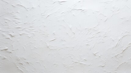 This image showcases a white textured plaster wall, featuring a random yet engaging pattern that adds depth and character to the surface, suitable for various design uses.