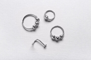 Rings for piercing on white background