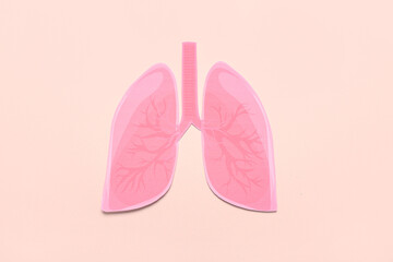 Paper lungs on beige background
