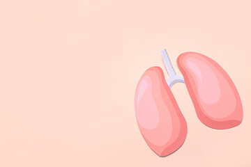 Paper lungs on beige background