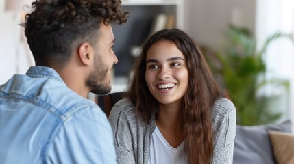 Obraz premium A young couple meeting with a mortgage broker, discussing home ownership and investment options