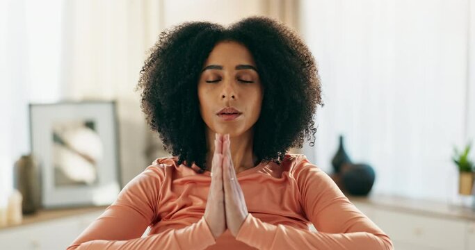 Home, yoga and meditation with prayer hands of woman for peace, relax and spiritual wellness or health. Apartment, female yogi and namaste pose for mindfulness, chakra and zen by girl in house