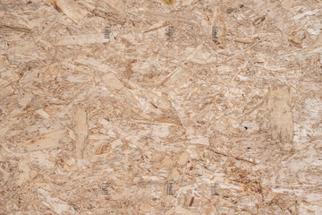 Construction background, texture and pattern in wood oriented strand board, OSP, panel
