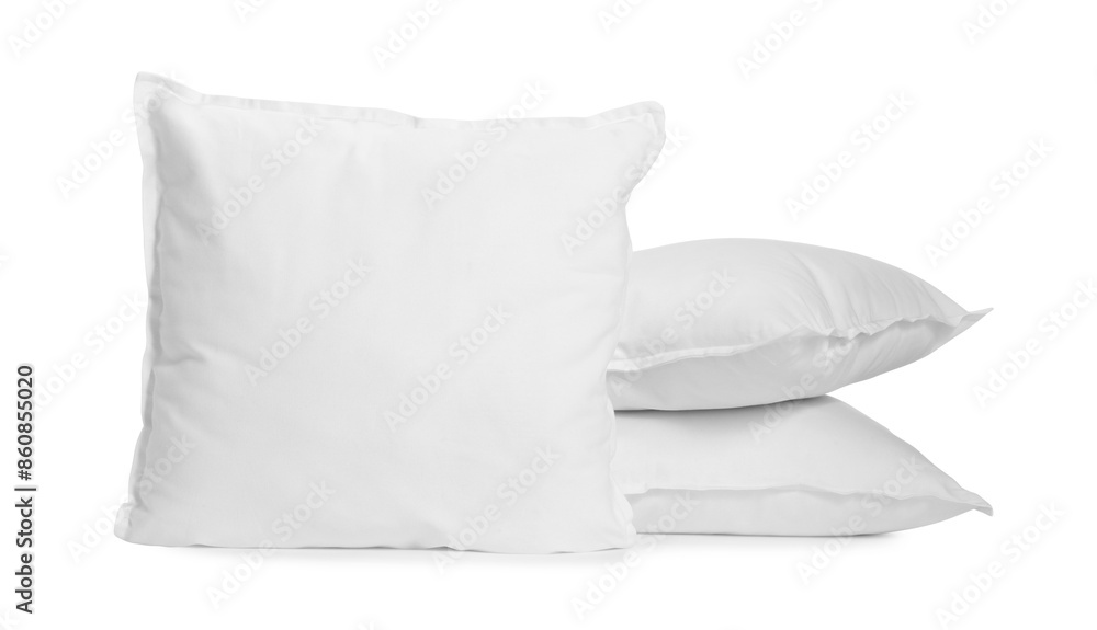 Wall mural Three new soft pillows isolated on white