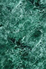 Fototapeta premium A detailed view of a green marble surface with its natural veining and texture
