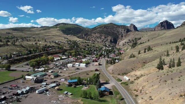 Creede, Colorado USA, Establishing Drone Shot of Small Mining Town in SUnny Landscape