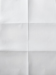 white textured sheet of paper folded in six