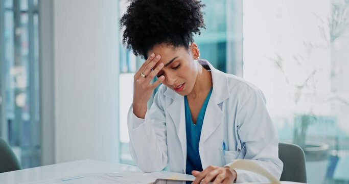 Frustrated woman, doctor and headache with documents, tablet or stress in depression, anxiety or pressure at hospital. Female person or medical employee with migraine, deadline or crisis at clinic