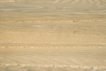 Naklejka premium texture of sand dunes in the desert, close up