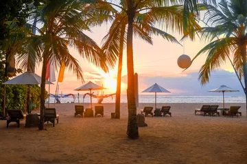 Fototapeten Bali Stunning beautiful sunlight beach with relaxing scenery on a beach. Famous travel destination in Sanur, Bali, Indonesia.  © farizun amrod