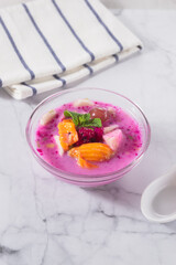 Sop Buah or Es Buah is Mixed Fruit with Coconut or Simple Syrup, Served with Shaved Ice and add Condensed Milk to Add Creamy Sweetened, Popular for Iftar. 