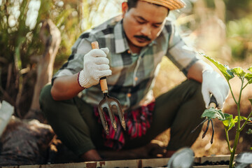 Farmers use shovels to prepare the soil for planting vegetables.