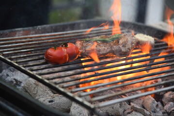 Banner BBQ Barbecue grilled meat stick on fire flame hot charcoal cooking outdoor. Banner Beef grilling picnic rib smoke bacon american cuisine. Grill pork heat bbq rack fire flame with copy space